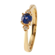 Ladies 0.5CTW Sapphire And Diamond 14K Yellow Gold Ring - Fashion Strada